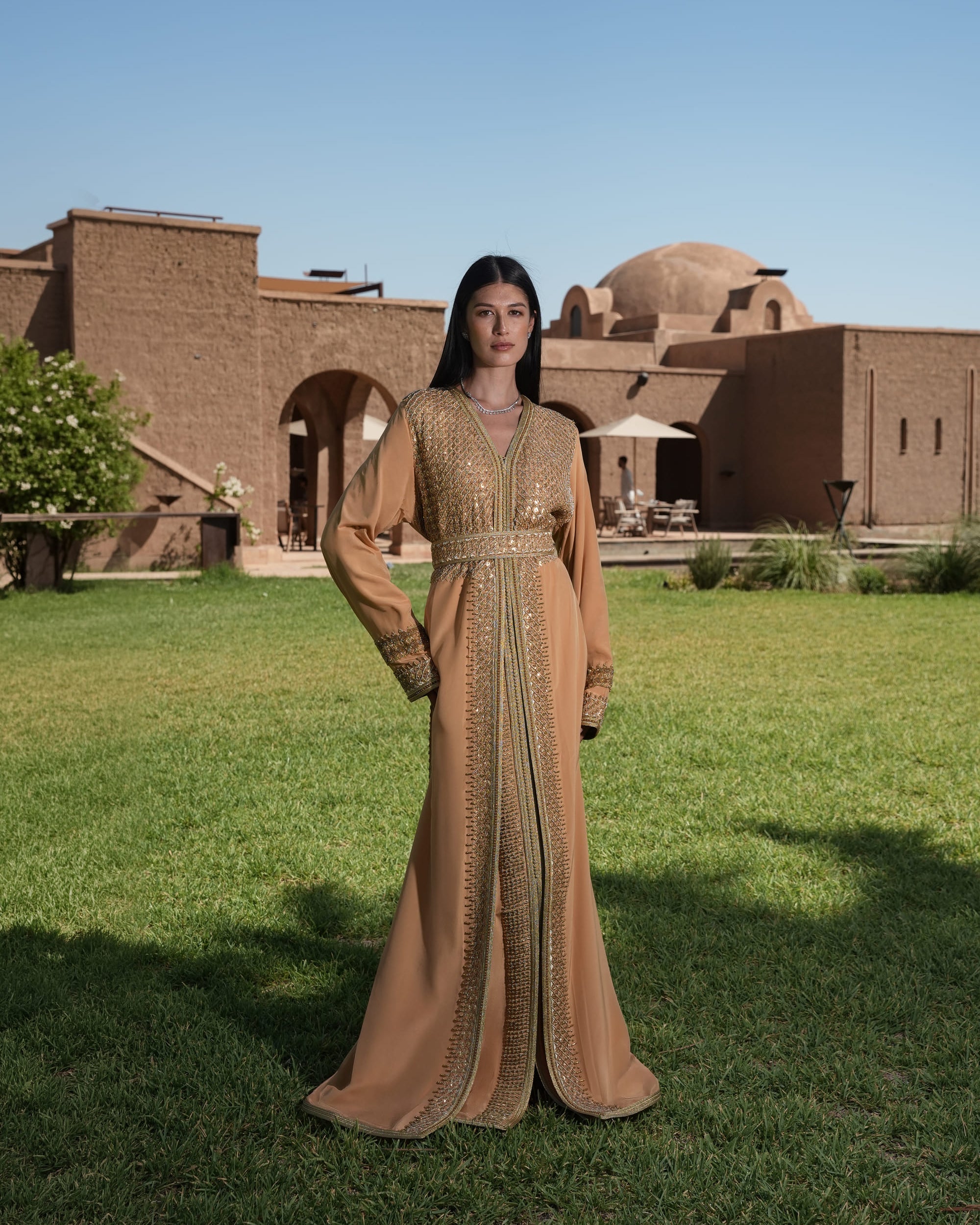 Amber Vigil apricot crepe Moroccan kaftan with a gold sequin mesh plastron at the neckline
