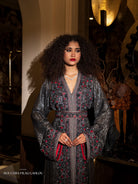 Scarlet Ash black Moroccan kaftan with red embroidery and shimmering sleeves