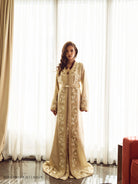 Silent Aureum full-length soft gold Moroccan kaftan with elongated silhouette